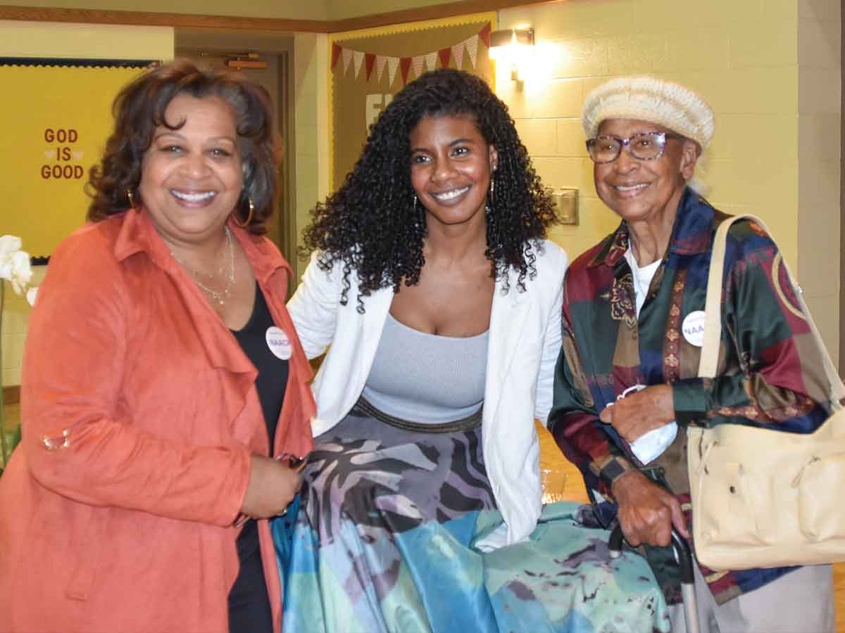 Nic Stone, author of &#039;Dear Martin&#039; with Carol Eggleston, Vice President of the Haywood County NAACP (left), and laTice Eggleston (right) at the First United Methodist Church welcome event in Waynesville last Thursday. Hannah McLeod photo