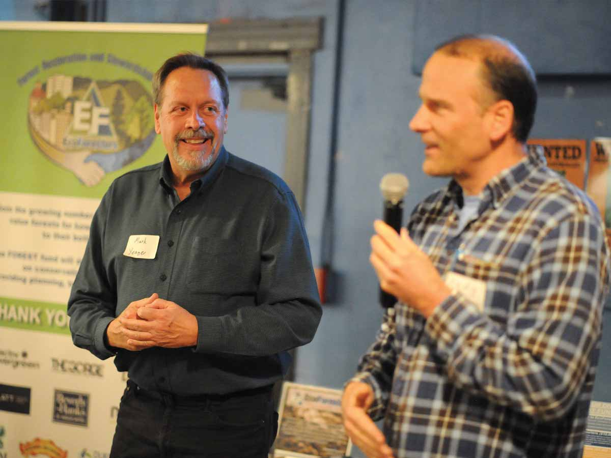 Andy Tait presents Mark Yeager (left) with the EcoForester of the Year Award. Donated photo