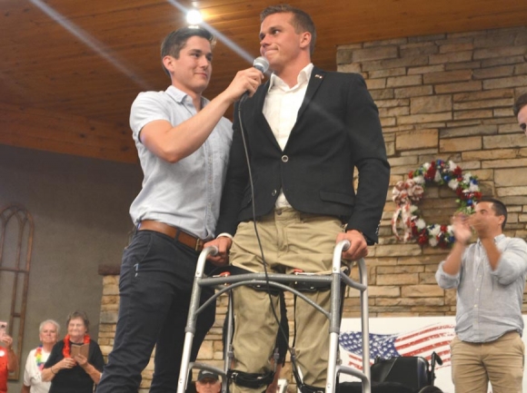 Madison Cawthorn, who mobilizes using a wheelchair, stands to address supporters at his June 23 victory party. Cory Vaillancourt photo