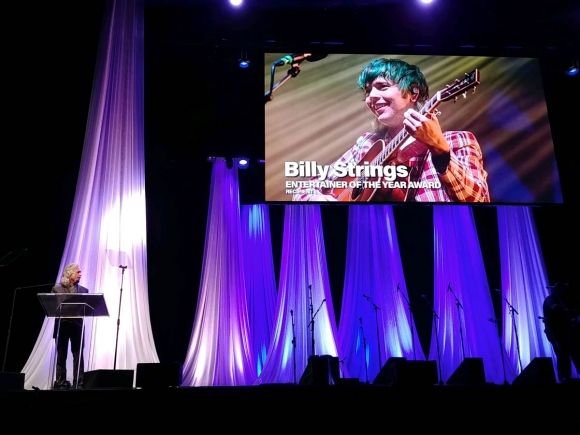 Billy Strings winning the IBMA ‘Entertainer of the Year.” (photo: Garret K. Woodward)