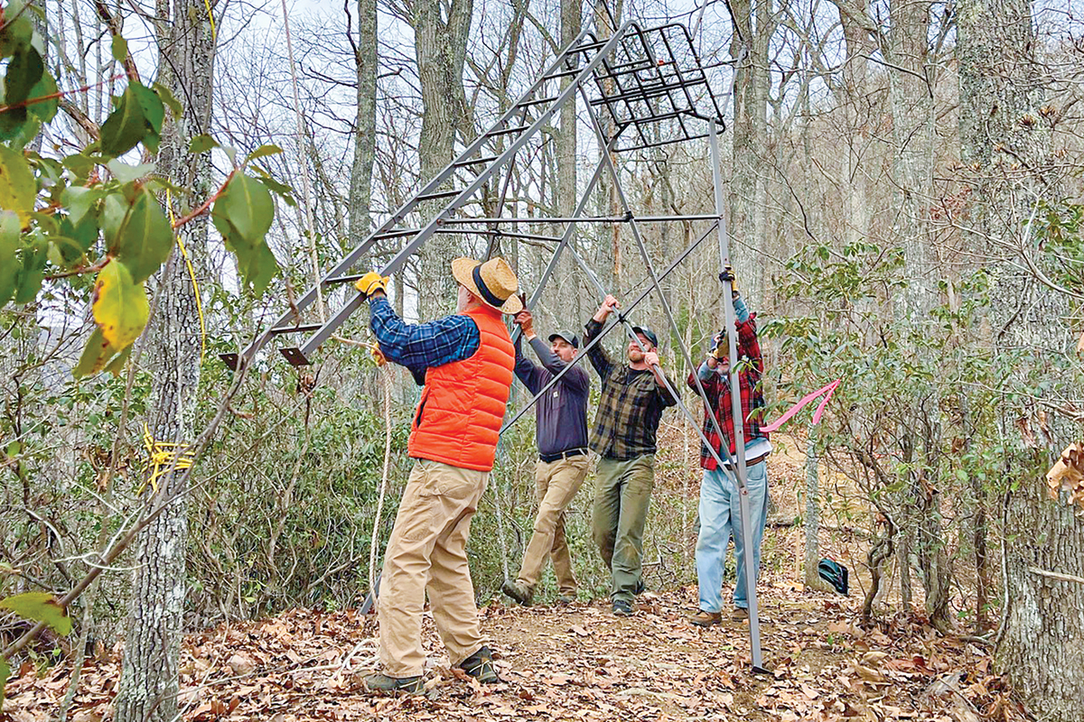 From left to right, Burt Kornegay, Ryan Holquist, Henry Kornegay and Chris Dickerson  raise a 16-foot tall steel watchtower on the ridge. Becky Kornegay photo.