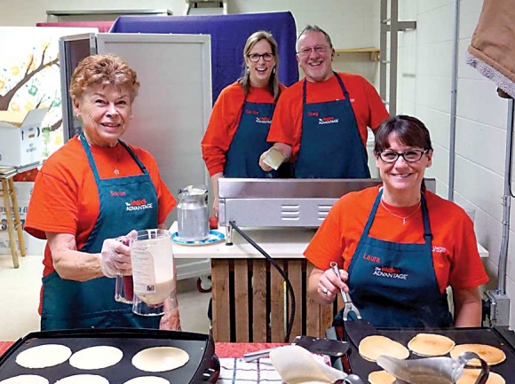 Volunteers prepare pancakes at First United Methodist Church of Waynesville. Donated photo