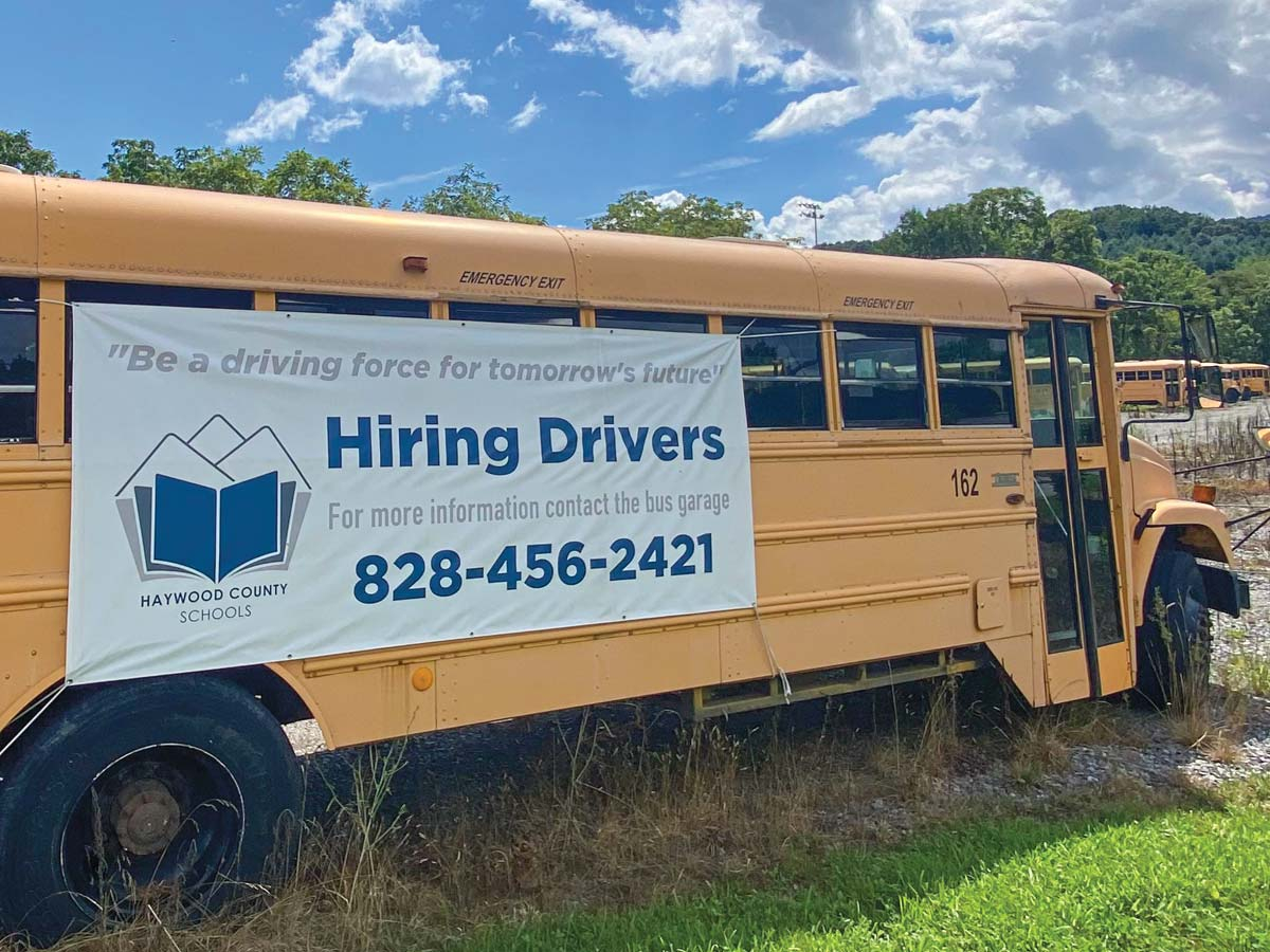 This banner hanging on a school bus in Haywood County advertises the need for bus drivers. Hannah McLeod photo