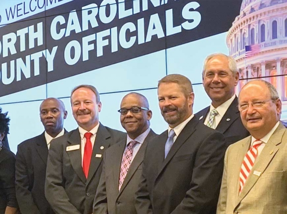 Commissioners Tommy Long (center left) and Brandon Rogers (center right) recently represented Haywood County at the National Association of Counties in Washington, D.C. Donated photo