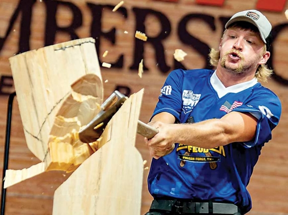 Darby Hand chops through a block of wood during a recent event. STIHL Timbersports photo