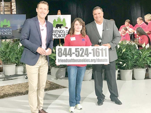 Jason Boyer (from left) of WLOS, Grace Friar and Russell Biven of WBIR during the 24th annual Friends Across the Mountains broadcast on Aug. 15. Donated photo