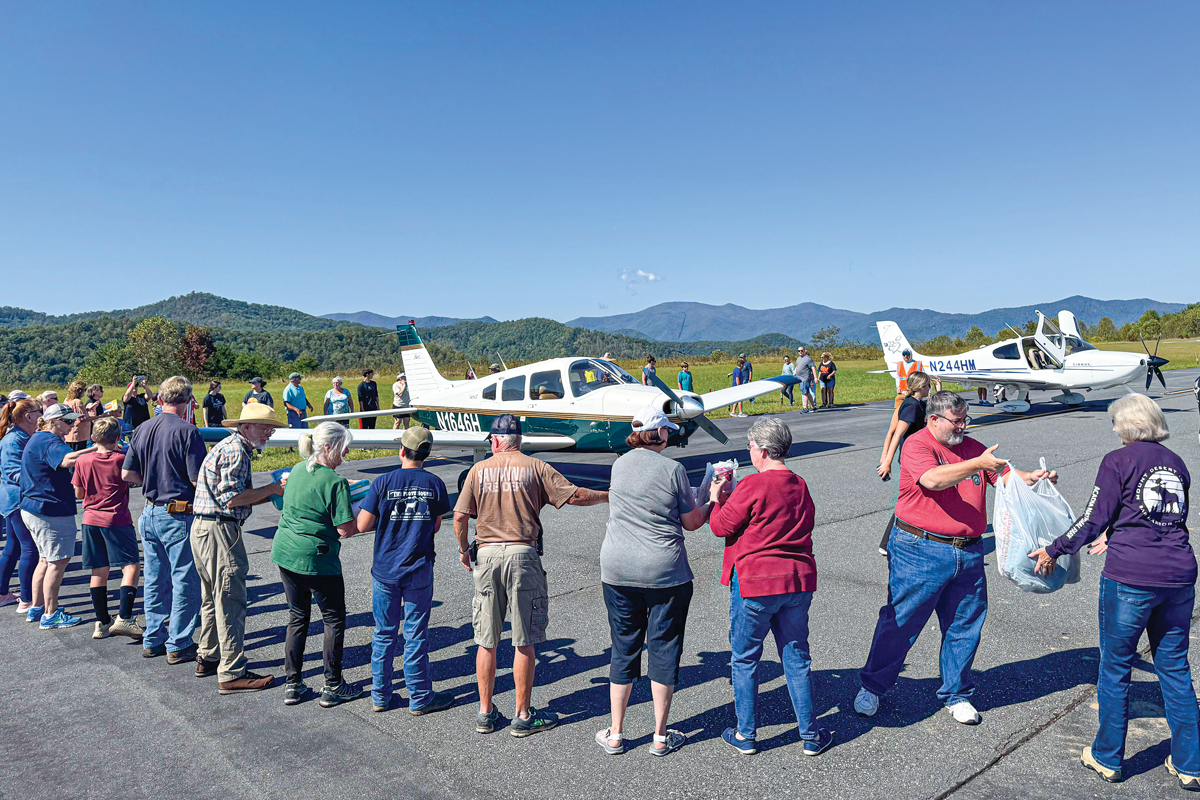 Volunteers unload supplies at Jackson County Airport. Nick Breedlove photo