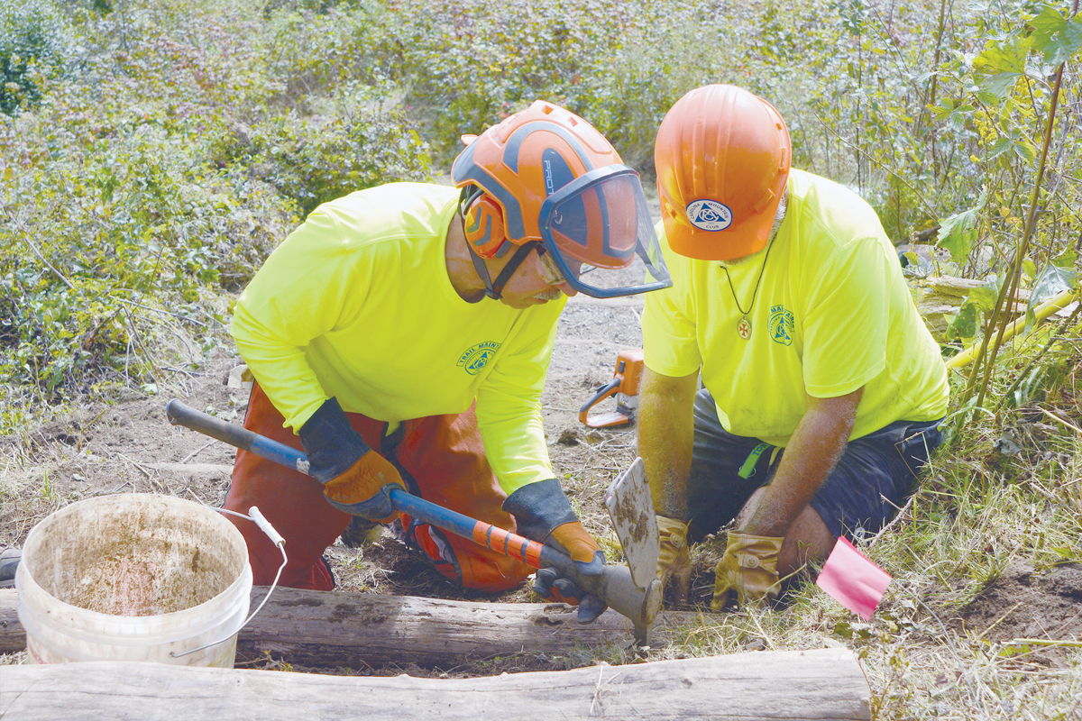 Volunteers build fences and stairs at Max Patch. Holly Kays photos