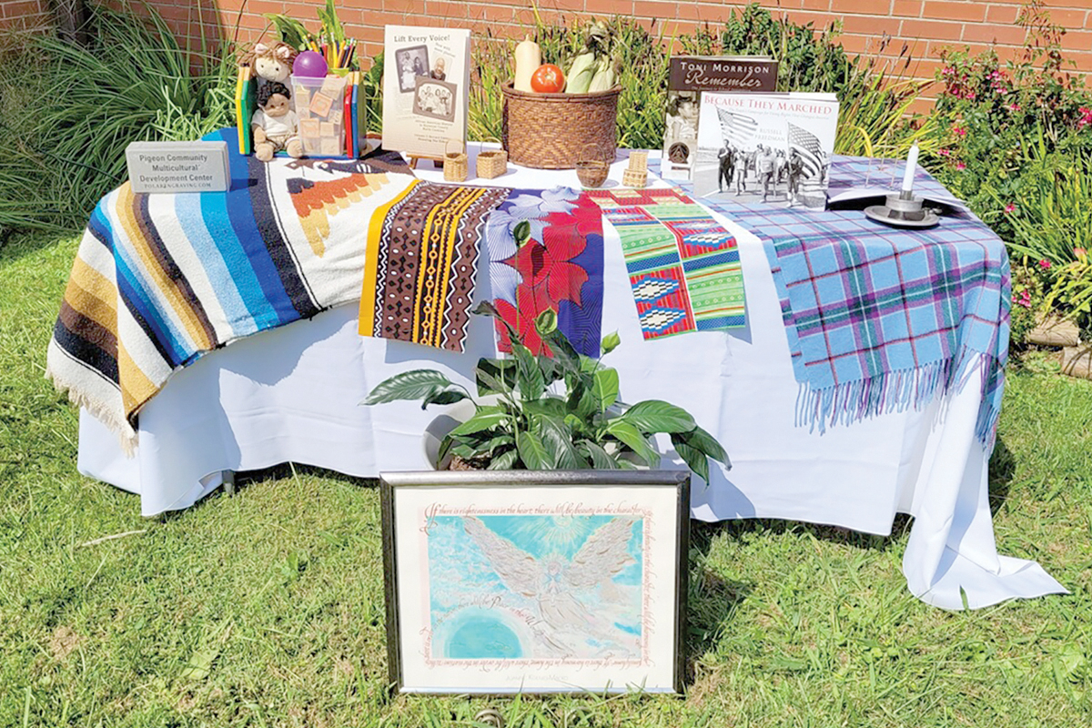 An altar was created for the celebration that featured the different efforts PCMDC has to create peace in the community.  Mary McGlauflin photo