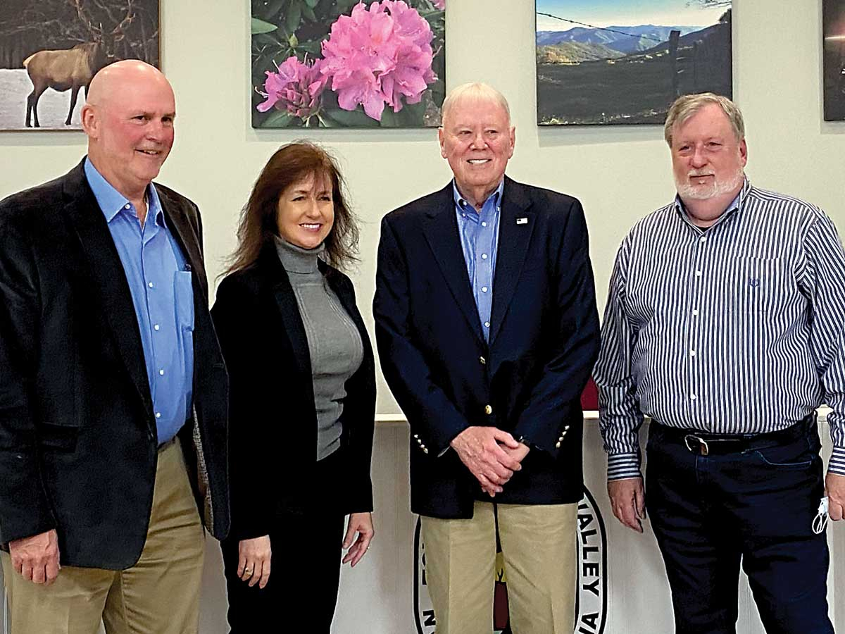 Board members, from left, John Hinton, Tammy Wight, Jim Ownes and Mayor Mike Eveland