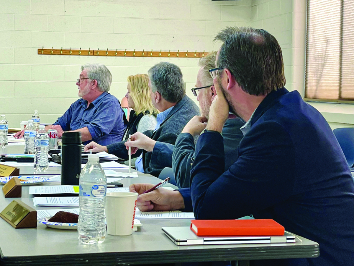 Members of Waynesville’s Town Council discuss issues during a recent retreat.