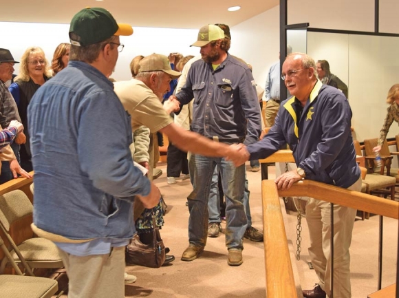 Swain County Sheriff Curtis Cochran shakes hands with his supporters after a candidate challenge against him was dismissed by the local board of elections in April. File photo