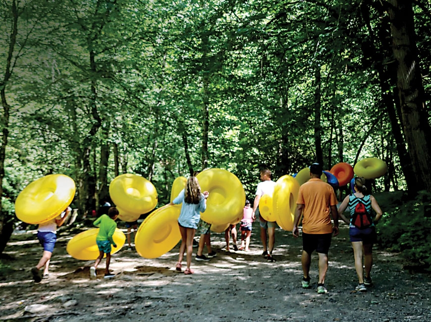 Tubers walk the path at Deep Creek, which has seen an enormous increase in usage this year. NPS photo