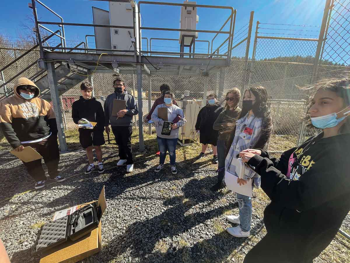Students visit an air quality monitoring site managed by the EBCI Air Quality Office during a February field trip. Donated photo 