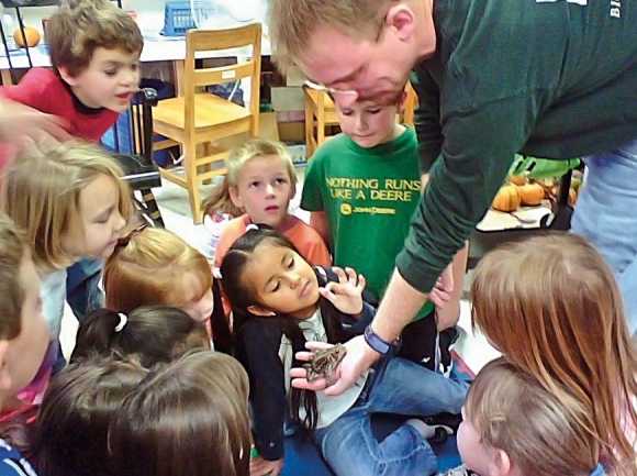 Kids gather around during a Highlands Nature Center program. Donated photo