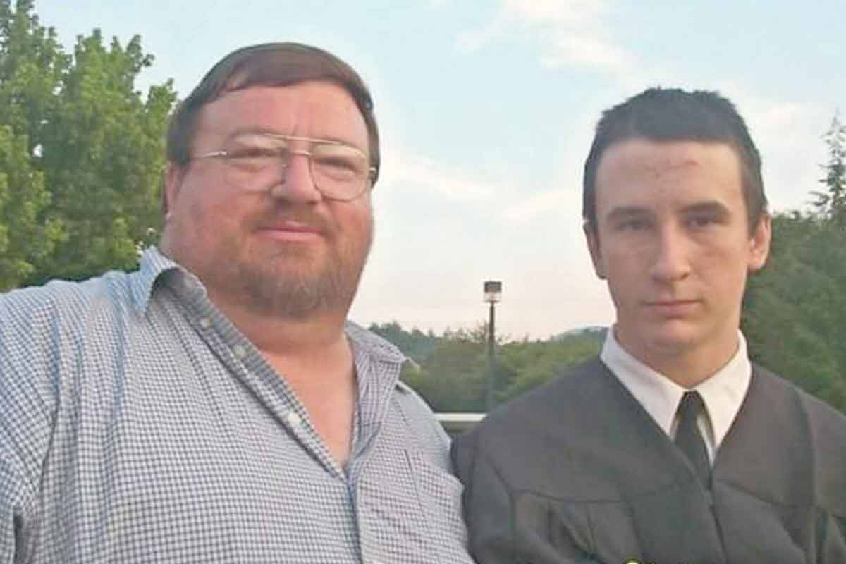 John Chapman Sr. with his son following his graduation from Pisgah High School.