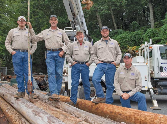 Work to install new broadband lines on WCU power poles began in 2018 and is expected to wrap up by May. File photo