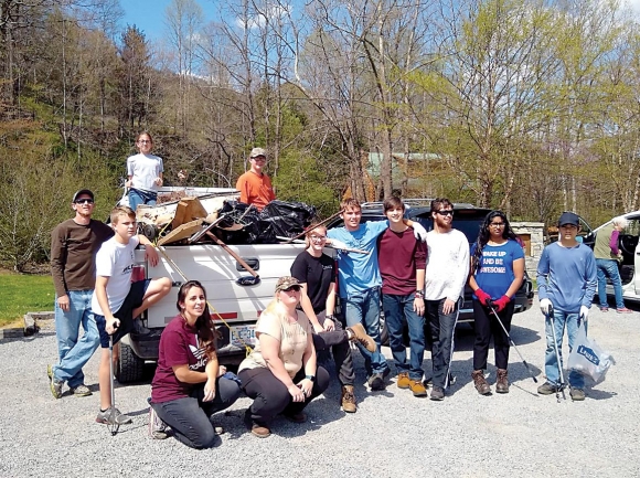 Volunteers pose after a cleanup event. Donated photo