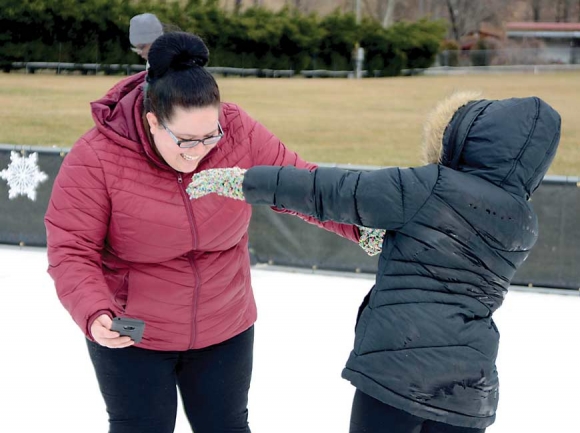 Skaters engage in some light horseplay at Maggie on Ice. Holly Kays photo