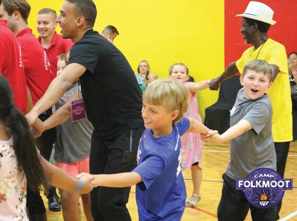 Dancers from Hungary, Egypt and the Bahamas dance with kids from across the mountain region at Camp Folkmoot at the Folkmoot Center. Natalie Ruth Ballard photo