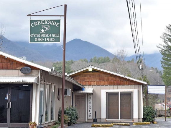Creekside Oyster House & Grill owner George Neslen hopes to expand to a new location but says up-front sewer and water fees of nearly $50,000 could make that impossible. Holly Kays photo