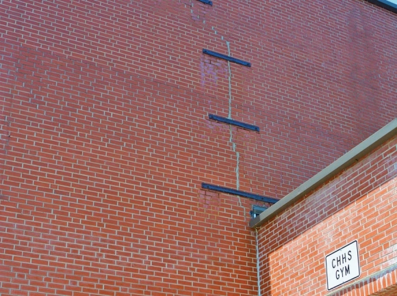 Metal straps hold cracking wall segements together at the Central Haywood High School Gym. Cory Vaillancourt photo