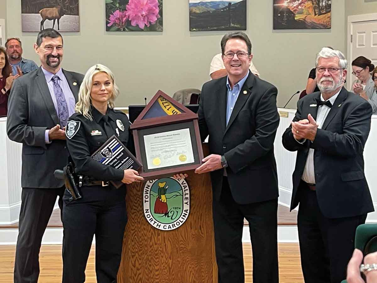 Bellows receives recognition (from left) from Rep. Mark Pless, Bellows, Sen. Kevin Corbin and Rep. Mike Clampitt. Kyle Perrotti photo