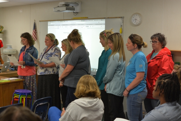 A group of teachers speaks on behalf of Interim head of School Joshua Morgan.