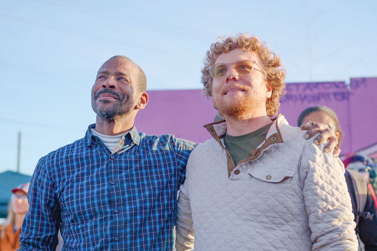 Author Brian Barth (right) stands with Monte, an unhoused friend he made while writing his book. 