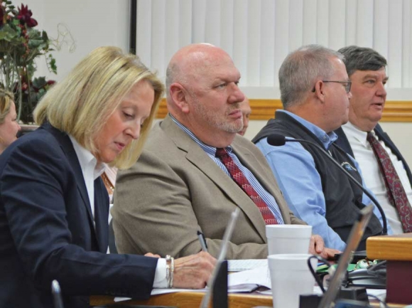 Haywood County Schools administrators (left to right) Superintendent Dr. Anne Garrett, Assistant Superintendent Dr. Bill Nolte, Human Resource Director Jason Heinz and Board Attorney Pat Smathers prepare for a board meeting Feb. 12. Cory Vaillancourt photo