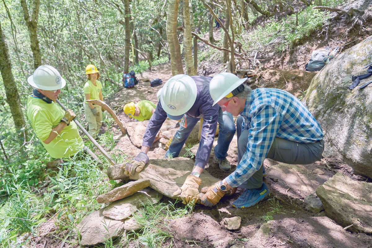 Volunteers work on the Sam Knob Trail. David Huff Creative photo 