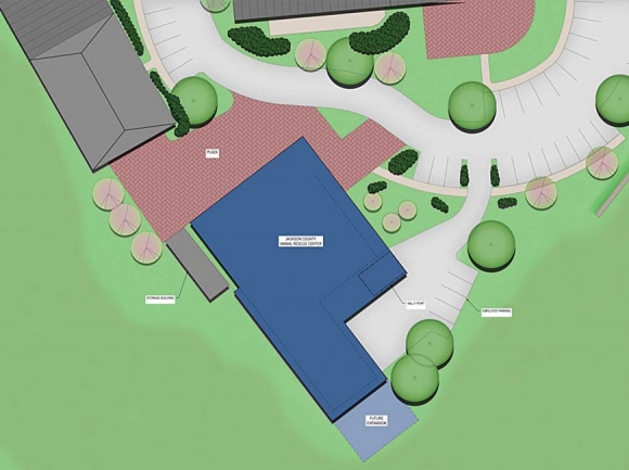 The new animal shelter (shown in blue) will replace the existing facility on Airport Road and be built on the site of the current Green Energy Park office. McMillan Pazdan Smith rendering