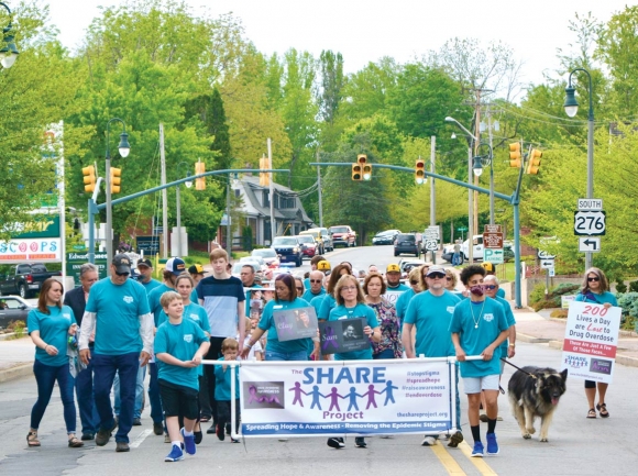 Nearly 200 people took part in a May 16 march in Waynesville, hoping to end the stigma surrounding drug abuse.