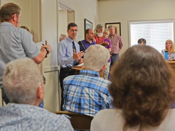 DOT engineer Brian Burch discusses the N.C. 107 project to a more-than-full room at Sylva Town Hall. Holly Kays photo