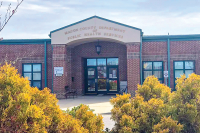 Macon County delays action on health board consolidation