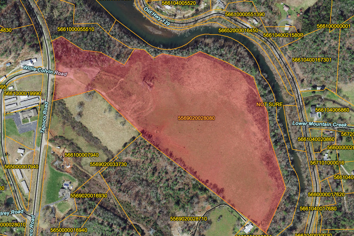 Located at the southeastern end of Lake Santeetlah, a 32.45-acre tract in Graham County, shown here as the large parcel south of the river, will likely be the site of a new Cherokee cultural and language facility. Graham County GIS image