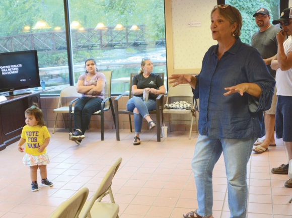 Teresa McCoy addresses the supporters gathered at her campaign headquarters as early results indicate her campaign could be in trouble. Holly Kays photo