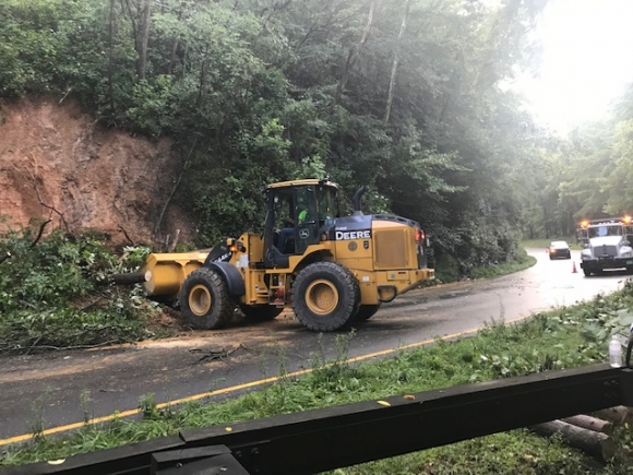 Heavy rain causes rock slides, fatality on Spur