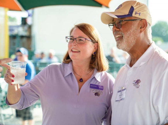 Western Carolina University Chancellor Kelli R. Brown meets with Ed Holland, president of the university’s Alumni Association, at the July 15 ‘Chancellor’s Welcome Tour’ event in Greensboro.