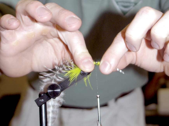 An angler ties a new fly. SMN photo