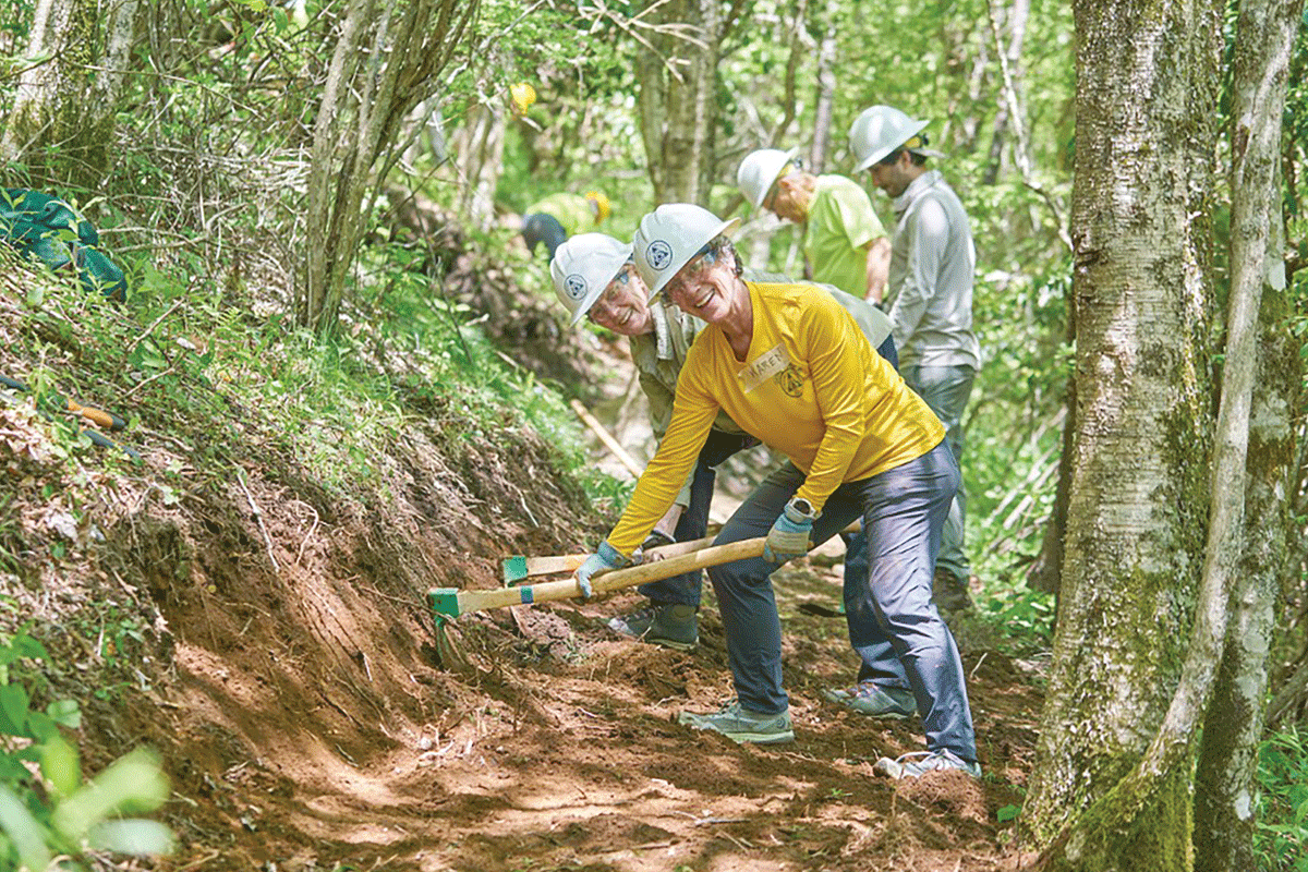 Carolina Mountain Club trail maintenance volunteers get some work done. CMC photo