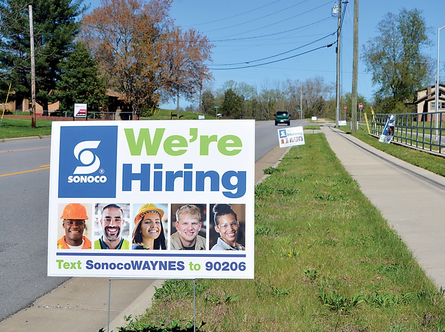 Signs outside Waynesville’s Sonoco Plastics promote a hiring fair in April, 2020. Cory Vaillancourt photo