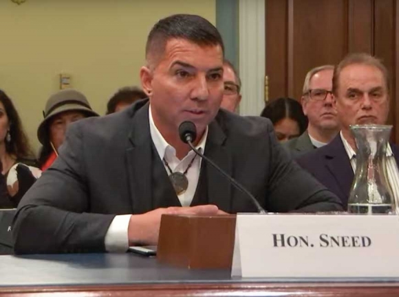 Principal Chief Richard Sneed addresses the House Subcommittee for Indigenous Peoples. Subcommittee chambers image