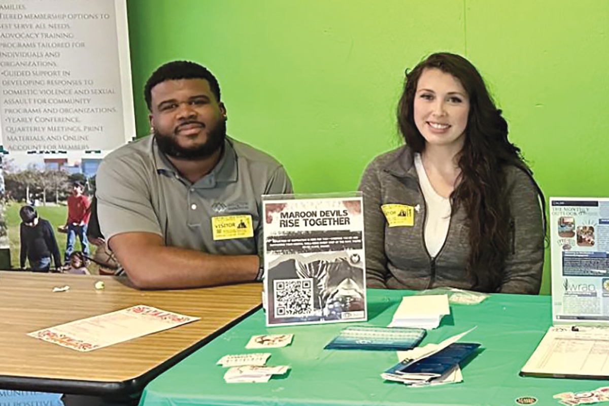 Demakus Staton (left) is Executive Director of Reflections of Inspiration and Kayla Brown is its Director of Operations. The pair were tabling at an outreach event.