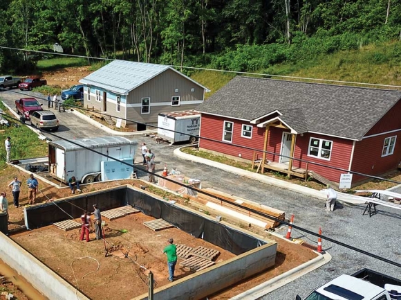 Haywood Habitat for Humanity is nearing completion of eight homes in the Walton Woods subdivision before starting a second community project in Chestnut Park. 