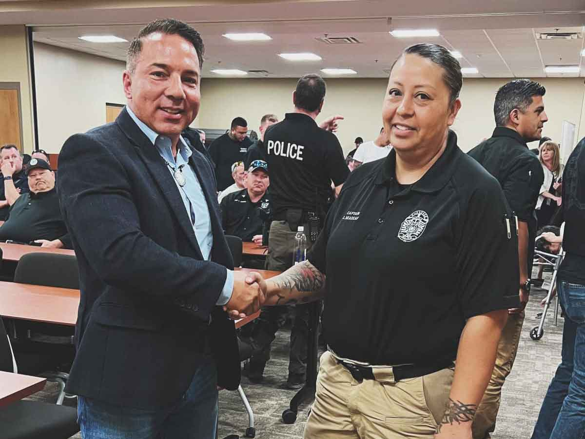 Principal Chief Richard Sneed welcomes Carla Neadeau as interim police chief. EBCI photo