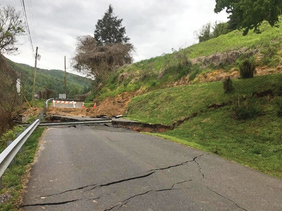 Cracks and earth movement on and around Allen Street have caused a 150-foot portion of the road to remain closed for more than a year. Donated photo