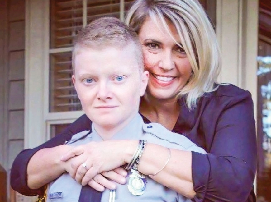 Macon County EMT Wendy Barker (left) and her wife Courtney, who is a state trooper, both contracted COVID-19 in January. Two months later, Barker is still working toward a slow recovery after unexpected symptoms. Donated photo