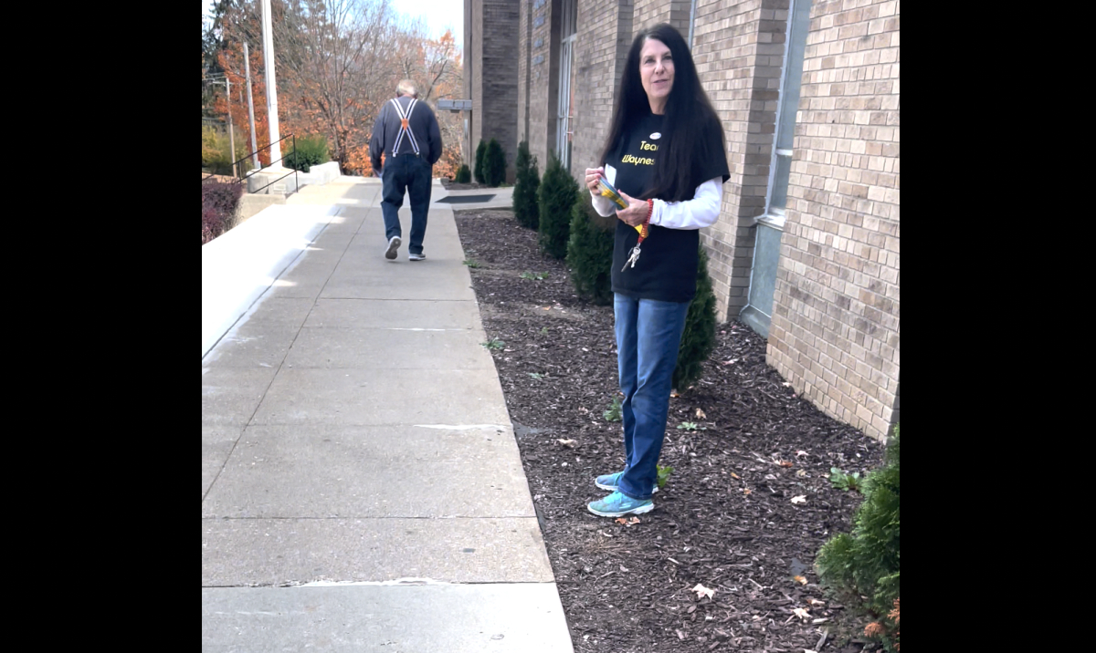 Sherry Morgan distributes campaign literature at the Waynesville Post office on the afternoon of Oct. 27
