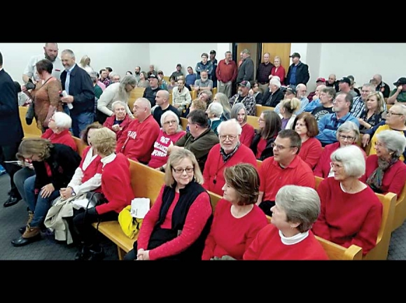 Macon County educators pack the Macon County courtroom Jan. 14 to ask commissioners to support a resolution to increase  pay for retired educators. Screenshot